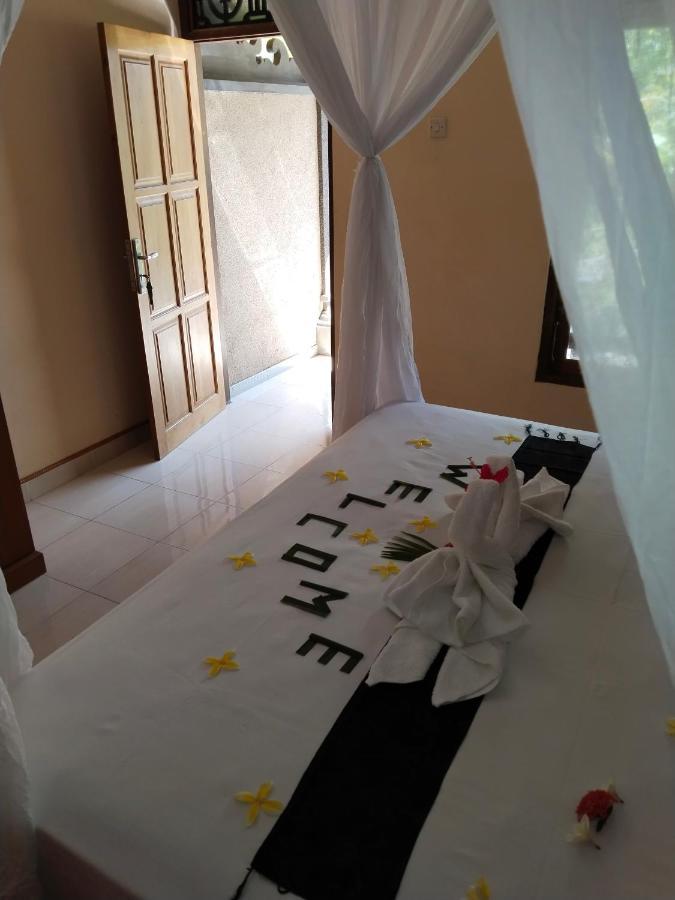 Asih Homestay ペムテラン エクステリア 写真