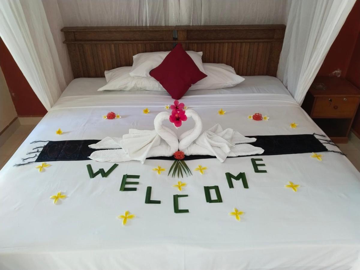 Asih Homestay ペムテラン エクステリア 写真