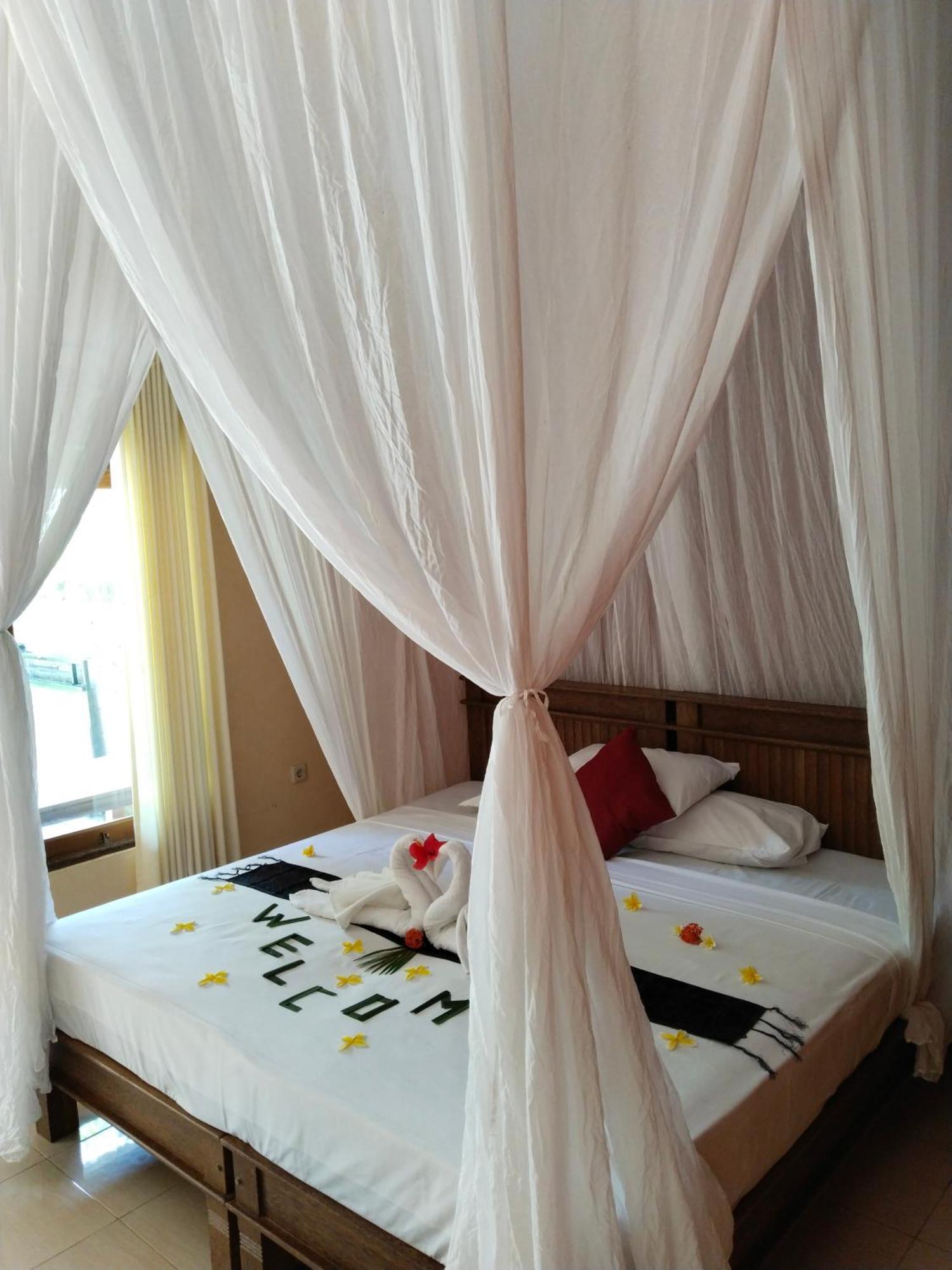Asih Homestay ペムテラン 部屋 写真